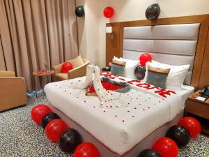 Letto o letti in una camera di ROZANA HOTEL
