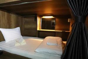 Postel nebo postele na pokoji v ubytování Saigon Chill Hostel
