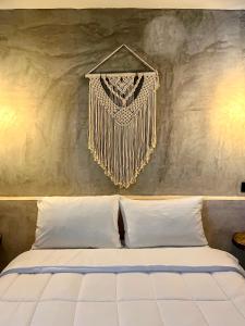 Voodi või voodid majutusasutuse Ariché Valladolid Hotel & Hostal toas