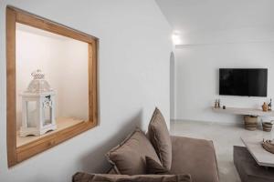 Televízia a/alebo spoločenská miestnosť v ubytovaní Ethereal house