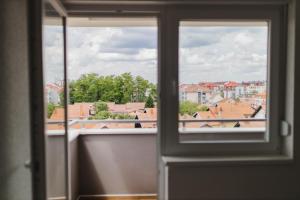 a view of a city from a window at Class Apartment in Brčko