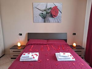 Posteľ alebo postele v izbe v ubytovaní Appartamento Roverella + 37 fotografií