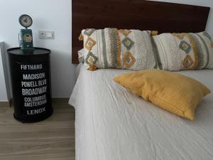 A bed or beds in a room at Aixa Granada