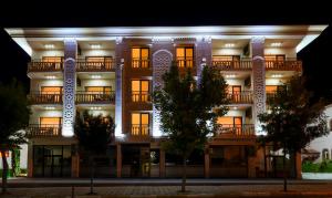 an apartment building at night with its lights on at Pearl of Cappadocia in Avanos