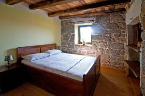 Ένα ή περισσότερα κρεβάτια σε δωμάτιο στο Casa Antica +11 φωτογραφίες