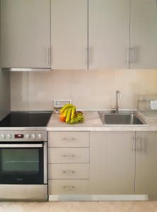 A kitchen or kitchenette at Vacations in Corfu-Antiperni by CorfuEscapes