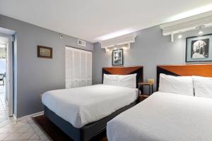 Postel nebo postele na pokoji v ubytování Hosteeva Oceanfront Spectacular Condo + 22 fotografií