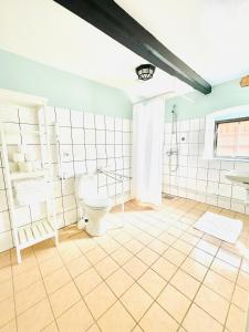 Koupelna v ubytování Gårdshotellet + 37 fotografií