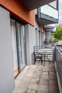 Balkón nebo terasa v ubytování AL-DOM Apartamenty Summer 4