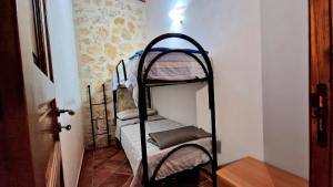 A bed or beds in a room at Dependence Desiree