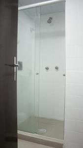 Um banheiro em Essência Hotel Francisco Beltrão