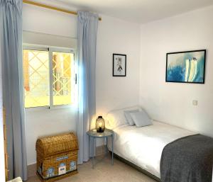 Posteľ alebo postele v izbe v ubytovaní Casa el Tejar - Apartamento céntrico y acogedor