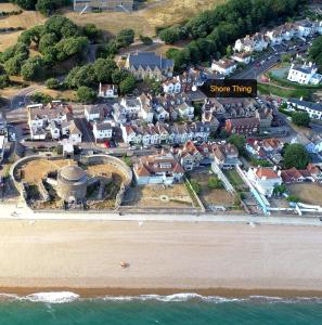 an aerial view of a town next to the beach at Shore Thing - Just a stones throw from the beach in Sandgate