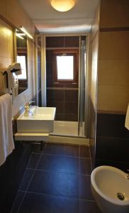 Koupelna v ubytování Hotel Torino