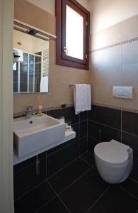 Koupelna v ubytování Hotel Torino