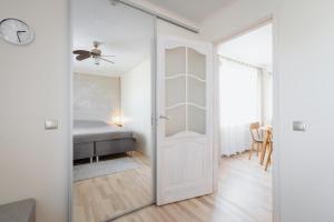 Postel nebo postele na pokoji v ubytování Kuuse 4 Apartment with 2 bedrooms