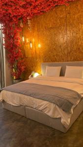 Llit o llits en una habitació de Al Maqsd Chalets