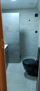 Kúpeľňa v ubytovaní Apartamentos Caleros