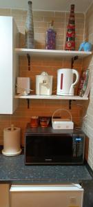 Kuchyňa alebo kuchynka v ubytovaní Apartamentos Caleros