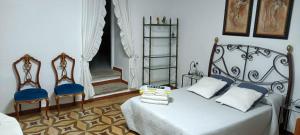 Posteľ alebo postele v izbe v ubytovaní Apartamentos Caleros