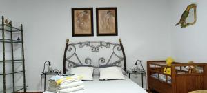 Posteľ alebo postele v izbe v ubytovaní Apartamentos Caleros