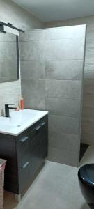 Kúpeľňa v ubytovaní Apartamentos Caleros