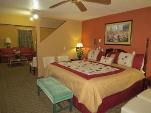 a bedroom with a large bed in a room at FIRST WESTERN INN in Caseyville