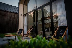 Fotografia z galérie ubytovania Czarne Domki v destinácii Zwierzyniec