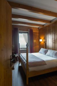 Postel nebo postele na pokoji v ubytování Albergo Ristorante Bucaneve + 37 fotografií
