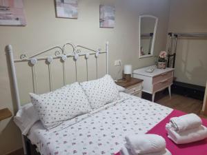 Кровать или кровати в номере CA' REMEDIOS