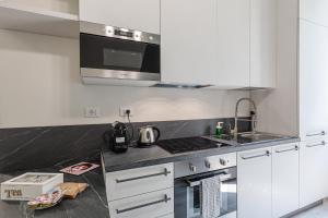 Kuchnia lub aneks kuchenny w obiekcie La Boutique Milano: appartamento in Porta Romana