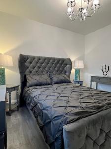 a bedroom with a large bed in a room at Lovely Apartment in Castlebar in Castlebar
