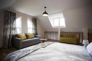 Ένα ή περισσότερα κρεβάτια σε δωμάτιο στο Hotel Donata