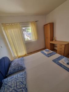 Posteľ alebo postele v izbe v ubytovaní Euromodus apartmani