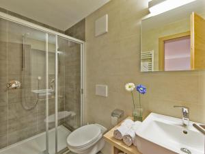 Kylpyhuone majoituspaikassa Garni Appartement Alpenresidence