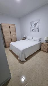 Posteľ alebo postele v izbe v ubytovaní APARTAMENTO ECONOMICO Y CENTRICO