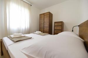 Posteľ alebo postele v izbe v ubytovaní Apartman u atraktivnoj kuci u nizu s garazom