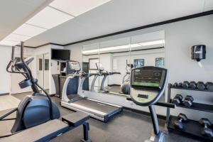 a gym with treadmills and elliptical machines at Best Western St Louis Kirkwood Route 66 in Saint Louis