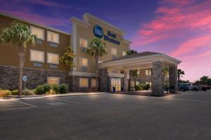 a rendering of a hotel with a parking lot at Best Western North Bryant Inn in San Angelo
