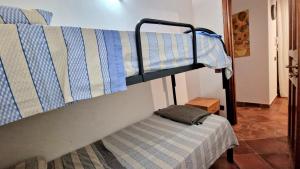 A bed or beds in a room at Dependence Desiree
