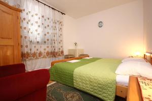 Apartment Orebic 4546c tesisinde bir odada yatak veya yataklar