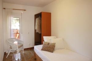 Posteľ alebo postele v izbe v ubytovaní Casa adosada en Pals Playa by Apartaments Golf