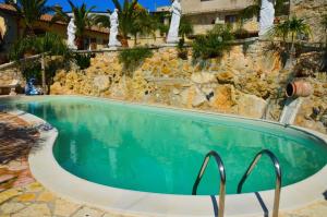 The swimming pool at or close to Dependence Desiree