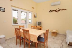 TV a/nebo společenská místnost v ubytování Apartments by the sea Postira, Brac - 5672 + 13 fotografií