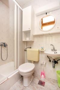 Koupelna v ubytování Apartments by the sea Cove Bristova, Hvar - 5716