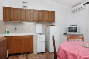 Kuchyň nebo kuchyňský kout v ubytování Apartment Nemira 5884b