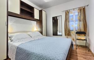 เตียงในห้องที่ Apartments by the sea Basina, Hvar - 5699