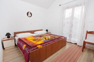 Postel nebo postele na pokoji v ubytování Apartments by the sea Bibinje, Zadar - 5866