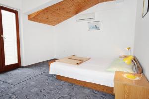 Apartment Vrsi - Mulo 5796a tesisinde bir odada yatak veya yataklar