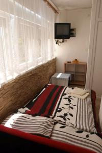 Posteľ alebo postele v izbe v ubytovaní Apartments and rooms by the sea Nin, Zadar - 5858